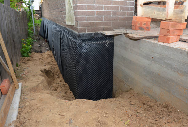 Happy homeowners after waterproofing job in Chesterville